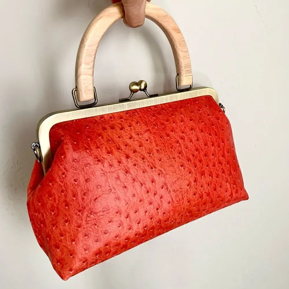 Handmade Genuine Ostrich Textured Cowhide, Wood Handle Kisslock Metal Frame Bag